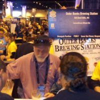 Brew Master Scott  pours beer at the great american beer  festival