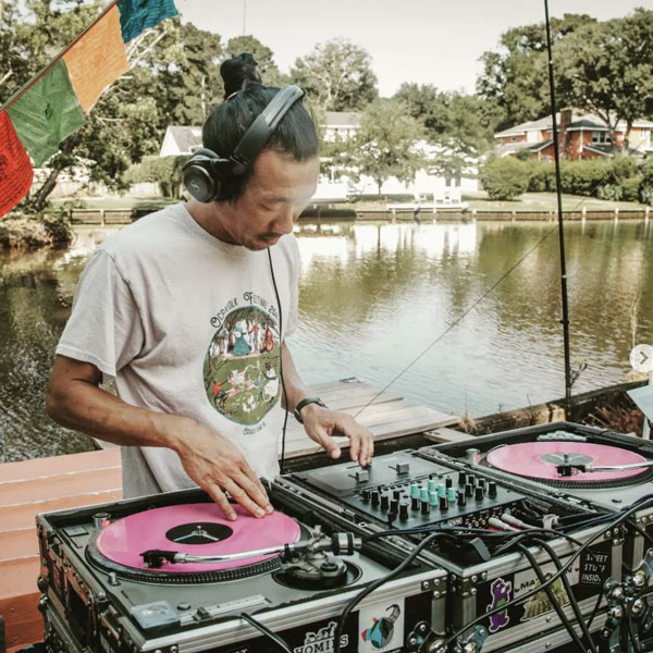 DJ Omon Ra spinning beats at the Outer Banks Brewing Station